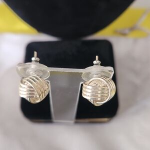 Sterling Silver love knot earrings.